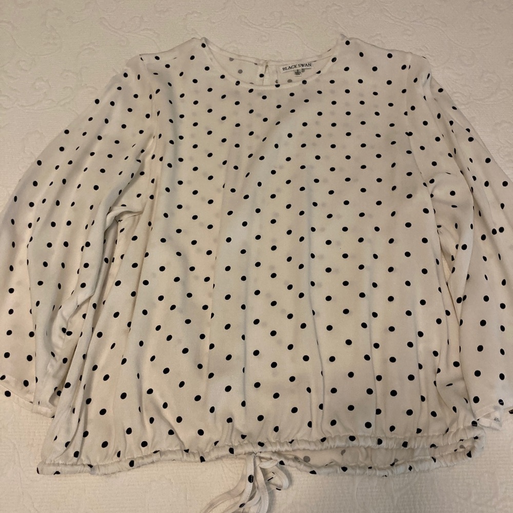 White with black polka dot blouse